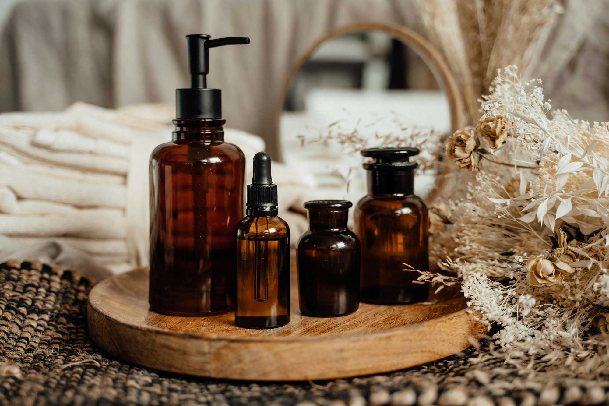 amber glass bottles containing tea tree oil solutions